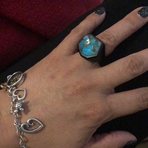 Ippolita resin black ring with hints of turquoise.